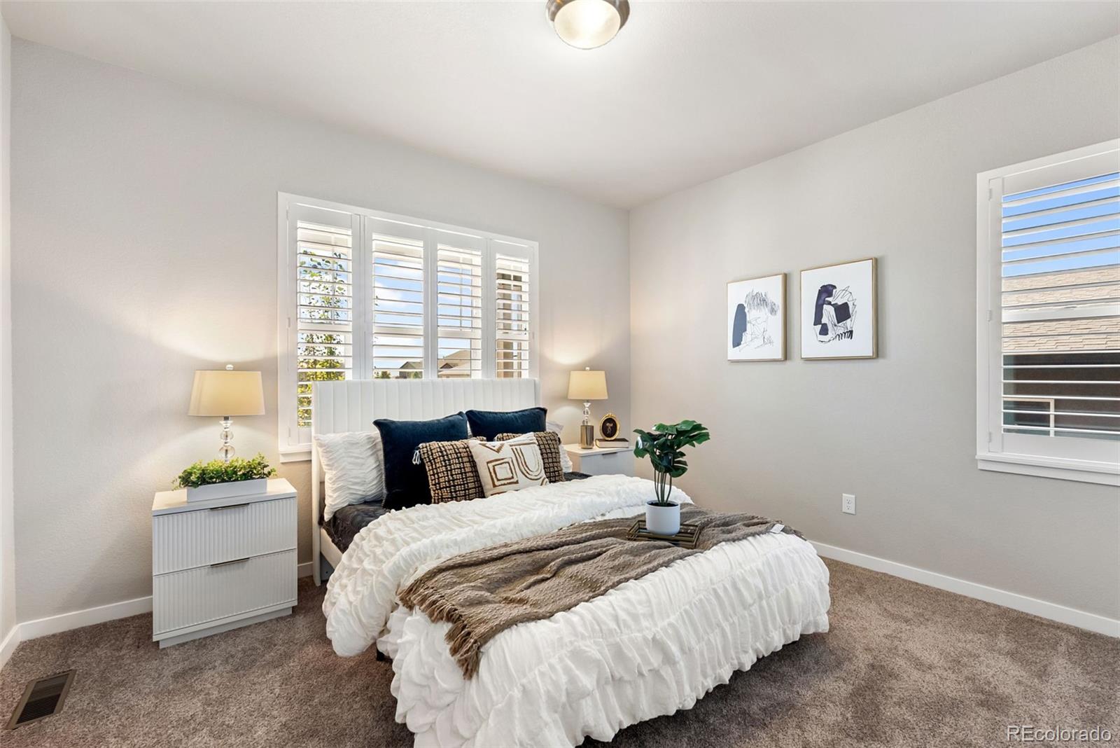 4508 Captain Jack Lane Colorado Springs, CO 80924 - Photo 5 of 50 a bed room with a bed and a window