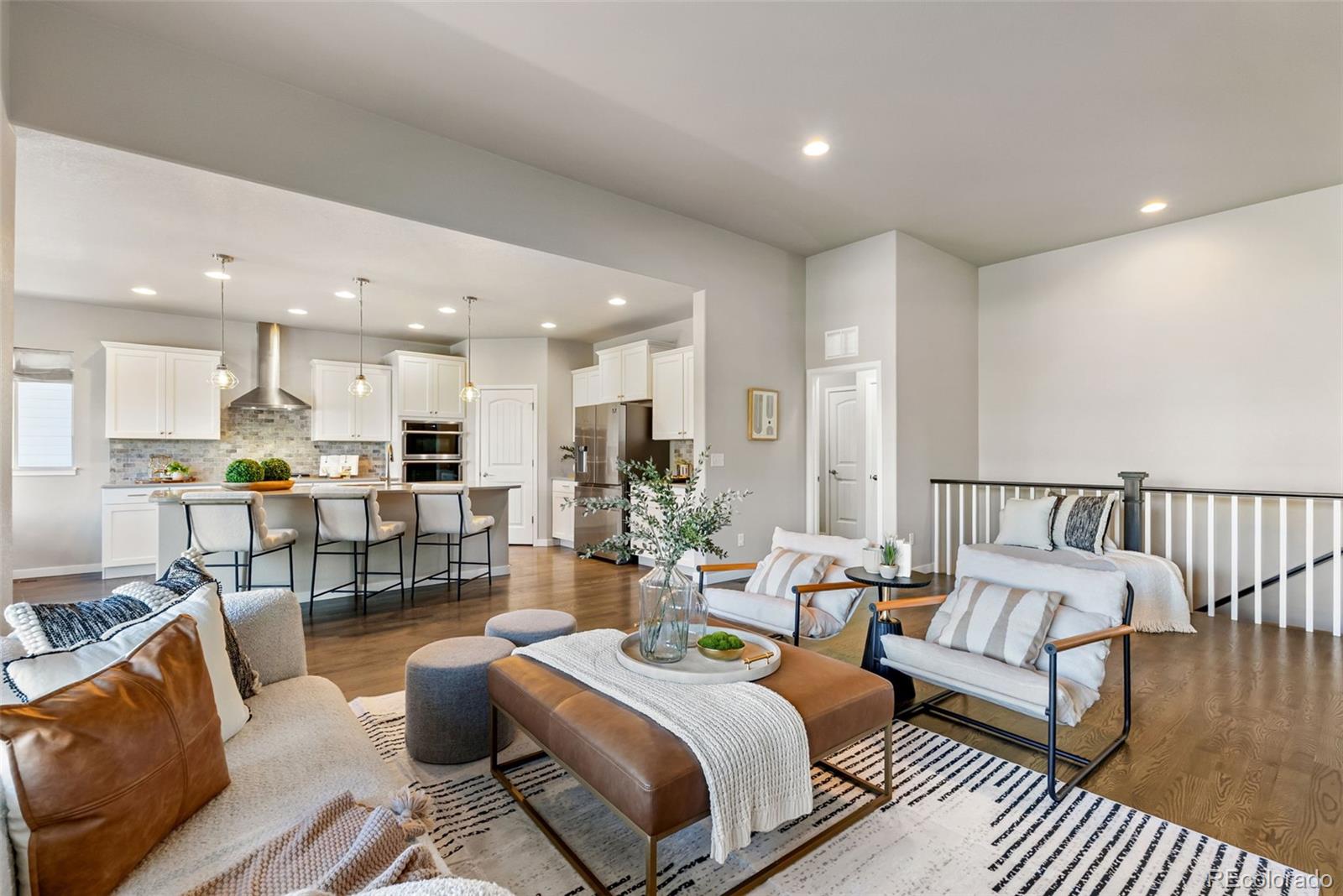 4508 Captain Jack Lane Colorado Springs, CO 80924 - Photo 10 of 50 a living room with furniture and a view of kitchen