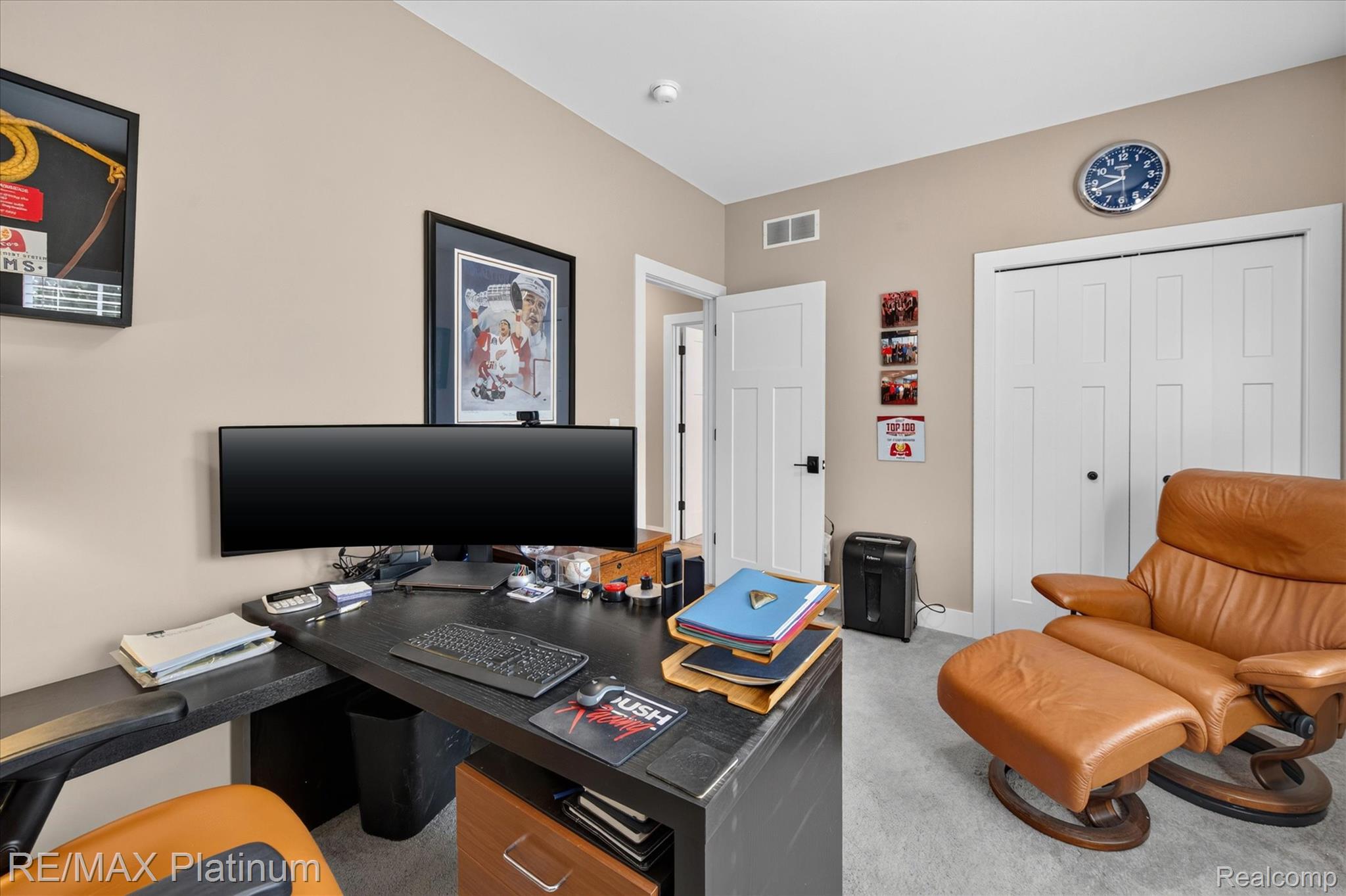 2676 Crooked Lake Road Howell, MI 48843 - Photo 29 of 60 Neutral wall paint, light gray carpet flooring, white trim, and white doors with dark hardware