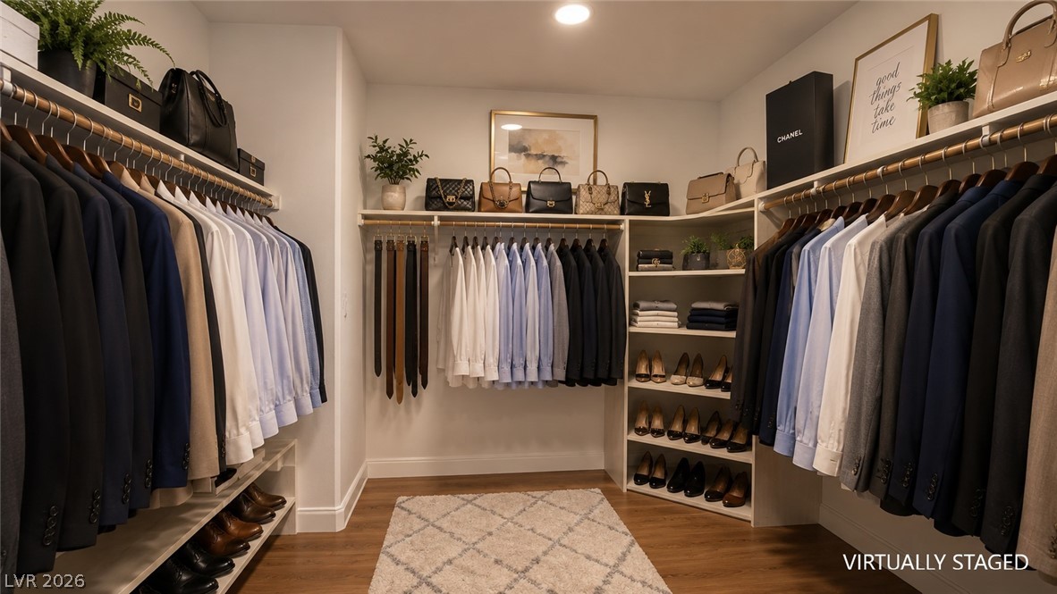 87 Tall Ruff Drive Las Vegas, NV 89148 - Photo 62 of 71 Ample closet space with built-in shelving and hardwood flooring creates an organized and refined dressing area.