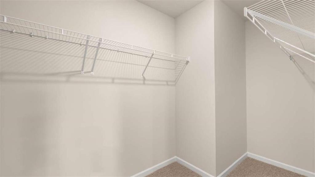 208 Cattle Drive Perry, GA 31069 - Photo 28 of 37 a view of a room with racks on the wall