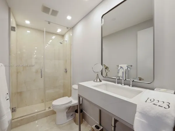 a view of a hallway with a washer and dryer