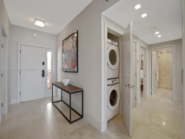 a view of a house with swimming pool and outdoor seating