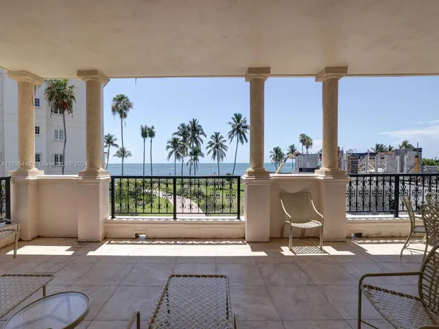 a view of swimming pool and lake in back