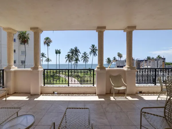 a view of a lake with a big yard