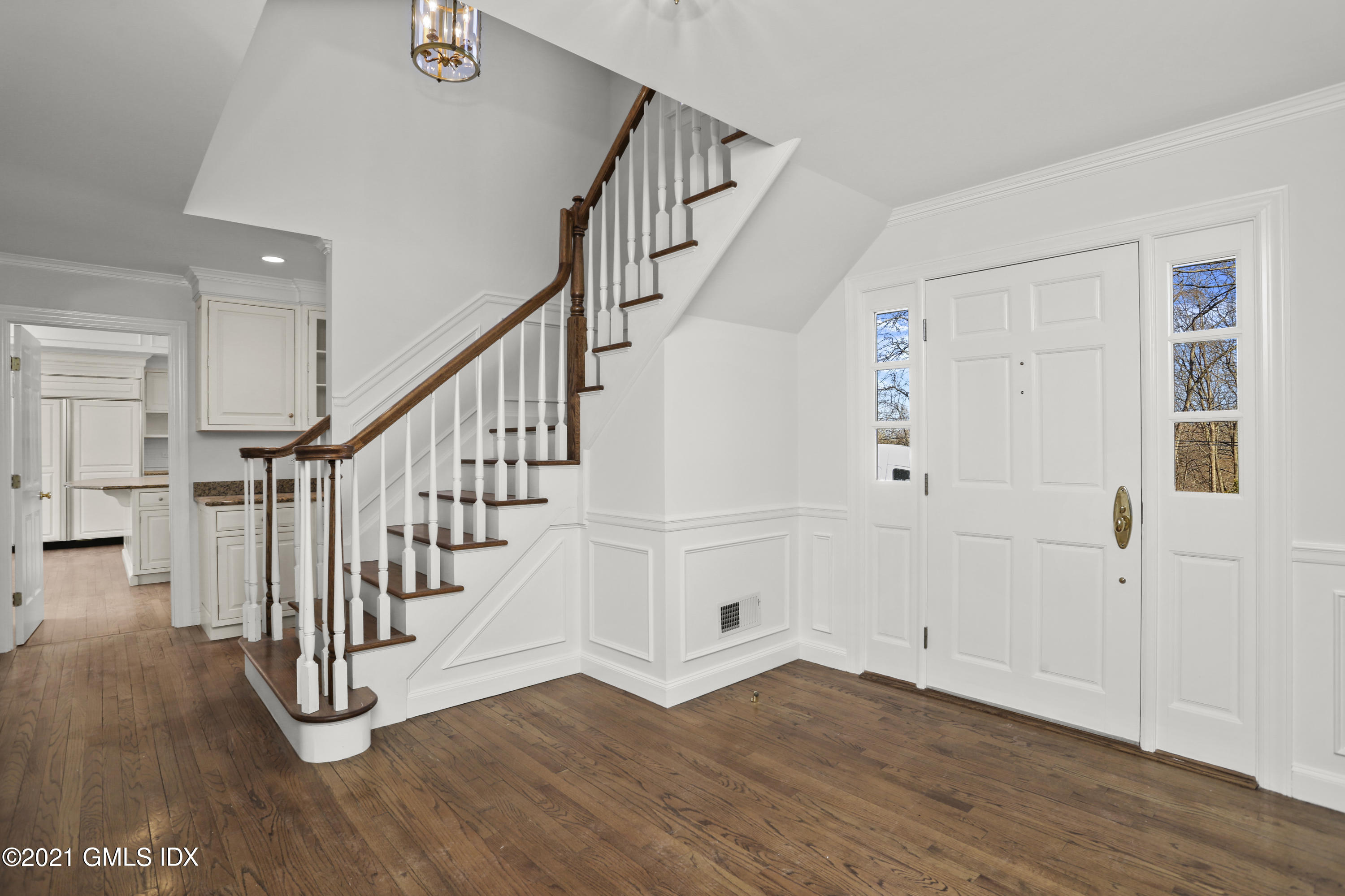 99 Hunting Ridge Road Greenwich, CT 06831 - Photo 14 of 23 a view of entryway and hall with wooden floor