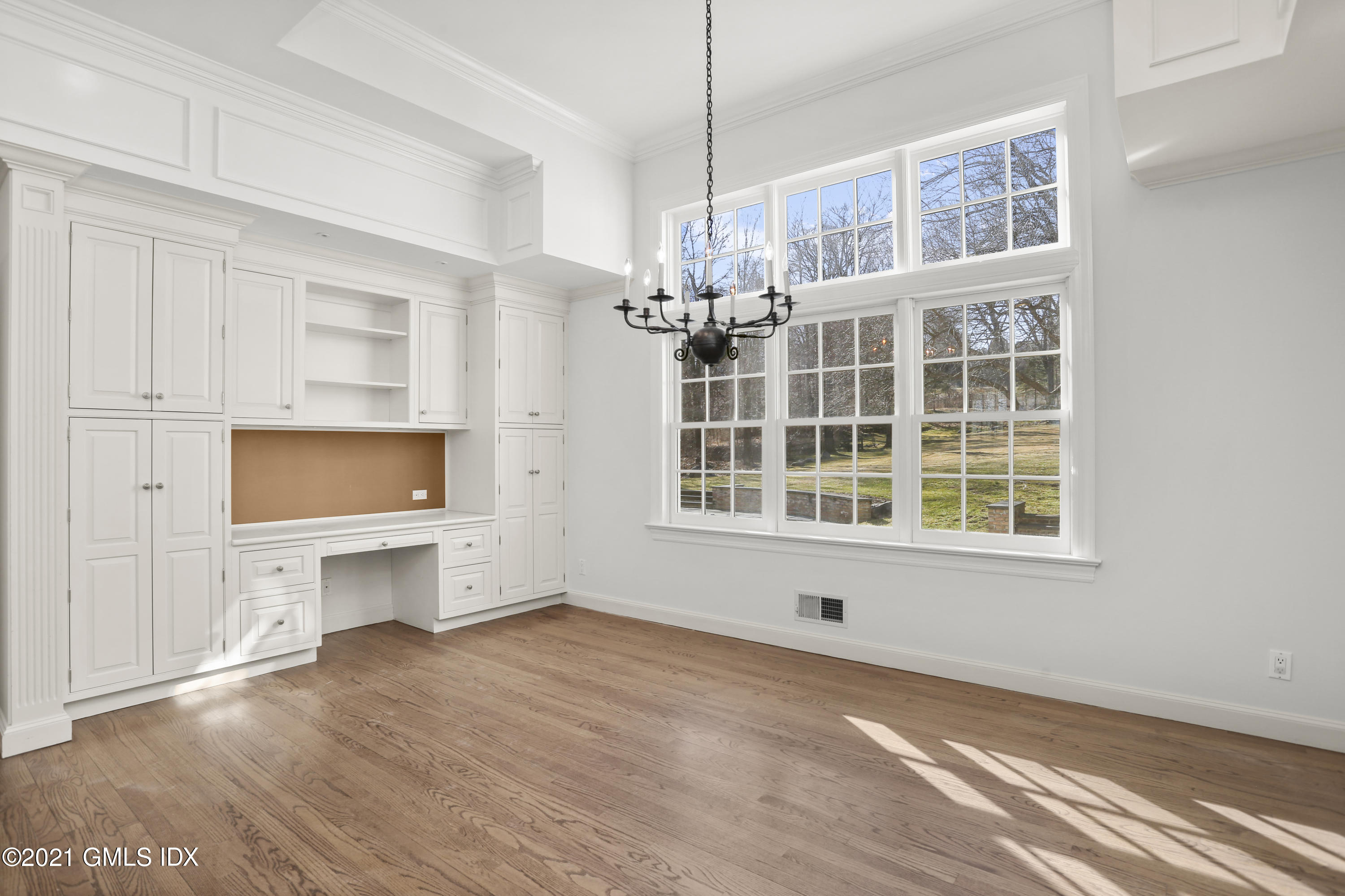 99 Hunting Ridge Road Greenwich, CT 06831 - Photo 6 of 23 a view of livingroom and kitchen with hardwood floor