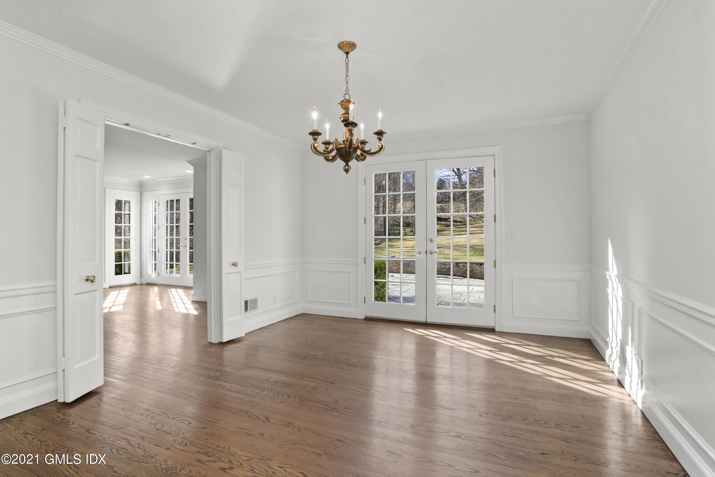 99 Hunting Ridge Road Greenwich, CT 06831 - Photo 10 of 23 a view of a livingroom with wooden floor