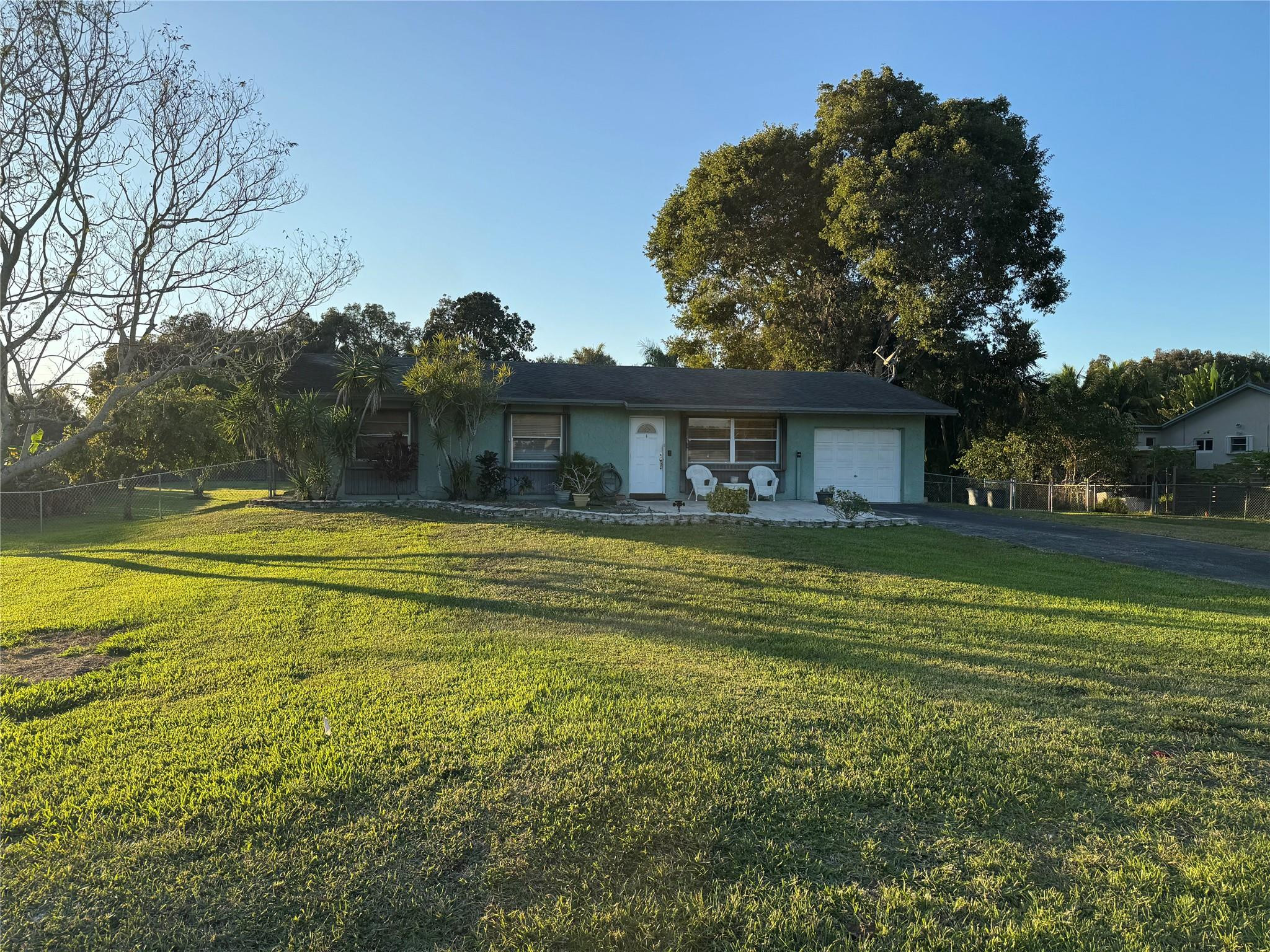 a view of a house with a swimming pool