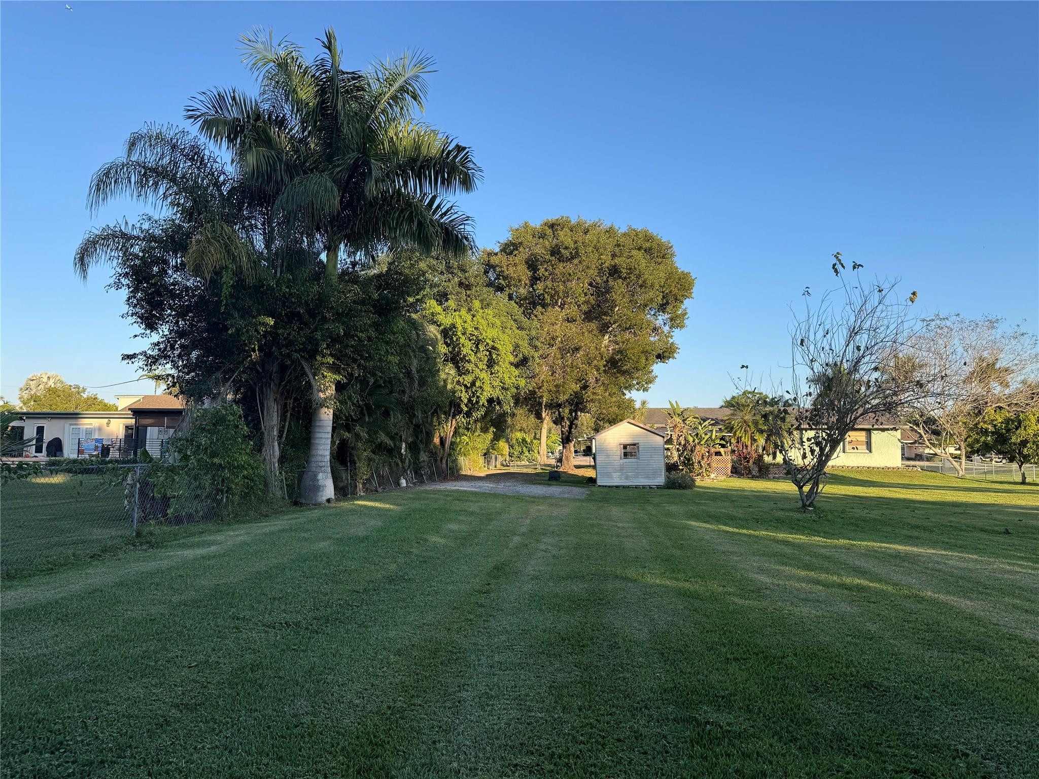 5221 Southwest 201st Terrace Southwest Ranches, FL 33332 - Photo 15 of 15 a view of a trees and grassy field