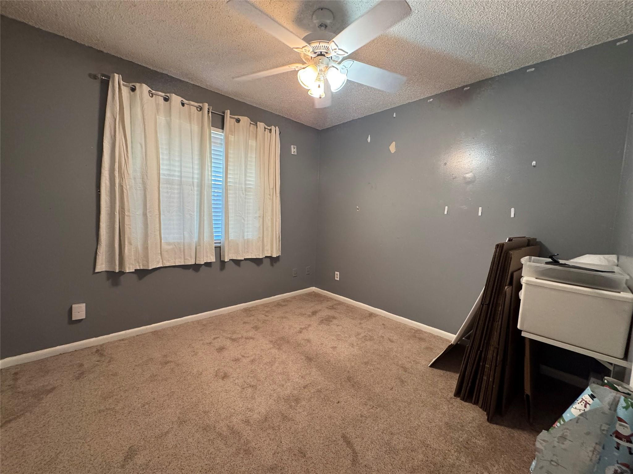 5221 Southwest 201st Terrace Southwest Ranches, FL 33332 - Photo 9 of 15 a view of a livingroom with a ceiling fan and window