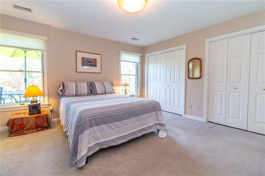 138 Abbey Road New Castle, PA 16105 - Photo 26 of 36 a spacious bedroom with a bed and a window