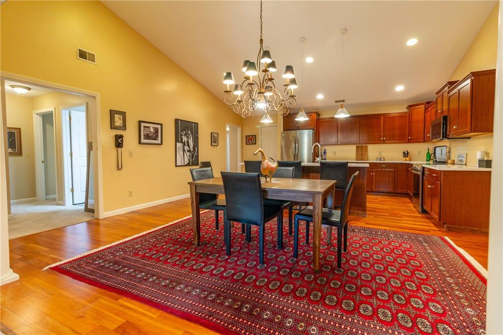 138 Abbey Road New Castle, PA 16105 - Photo 10 of 36 a dining hall with dining table and chairs