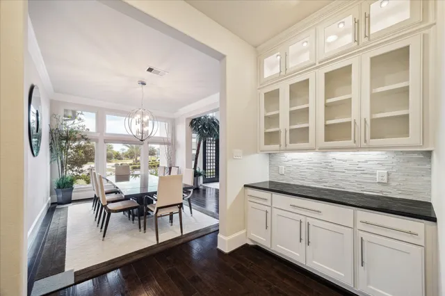 a living room with fireplace furniture and a flat screen tv