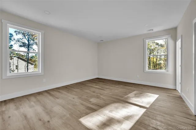 a view of an empty room and window