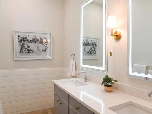 a bathroom with a shower and toilet