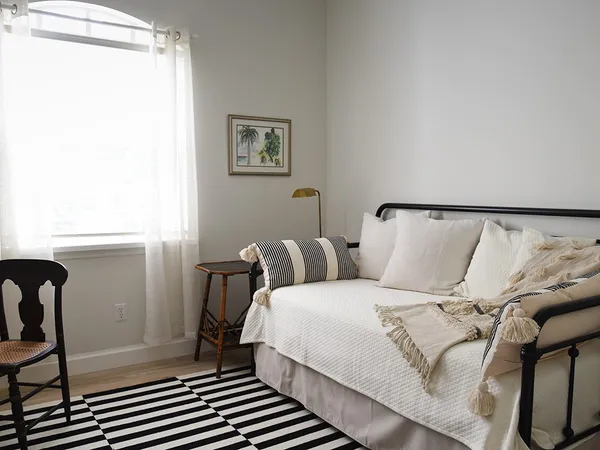 a view of a house with a yard and garage