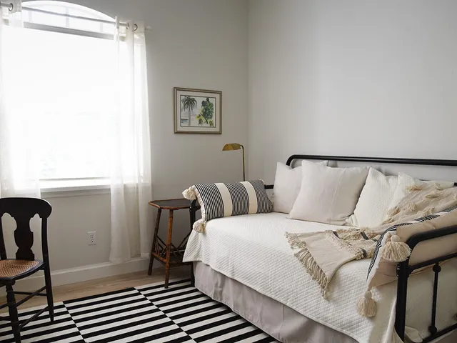 a view of a house with a yard and garage