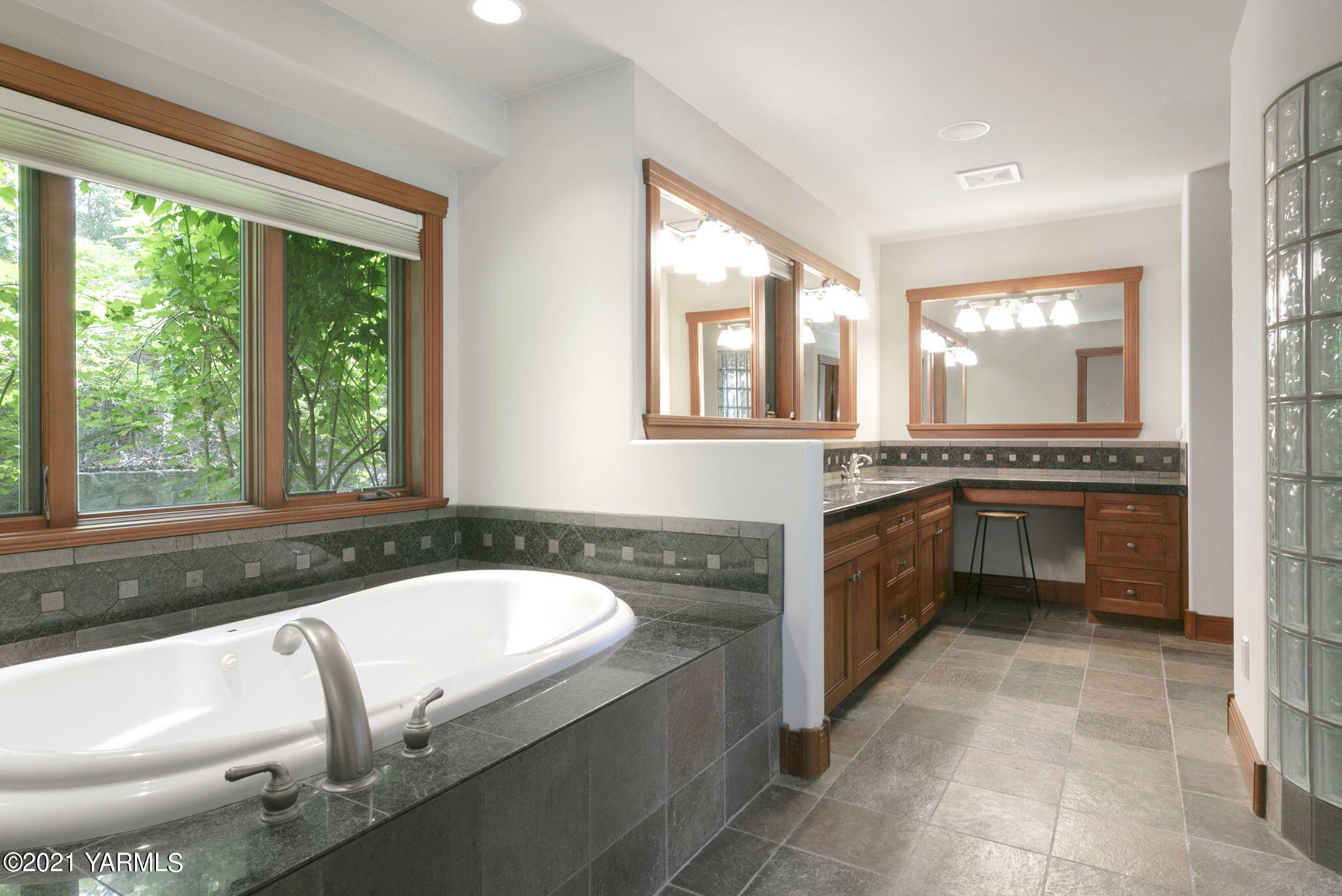 900 St Hilaire Road Yakima, WA 98901 - Photo 22 of 51 a spacious bathroom with a granite countertop tub and a sink