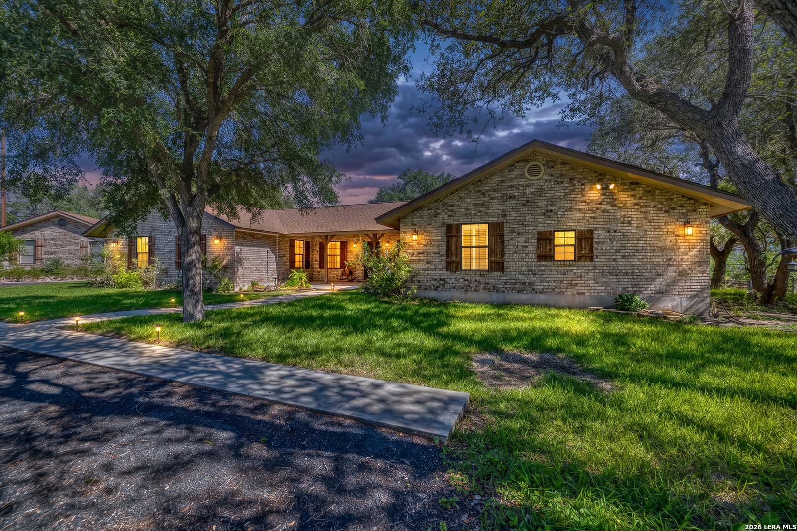 335 Sunset Ridge Road Uvalde, TX 78801 - Photo 6 of 8 a view of a house with a yard