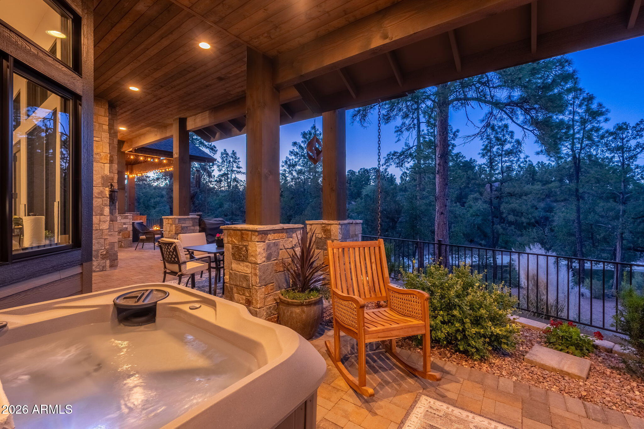 602 North Redbud Circle Payson, AZ 85541 - Photo 67 of 83 a view of a patio with table and chairs with wooden floor and fence