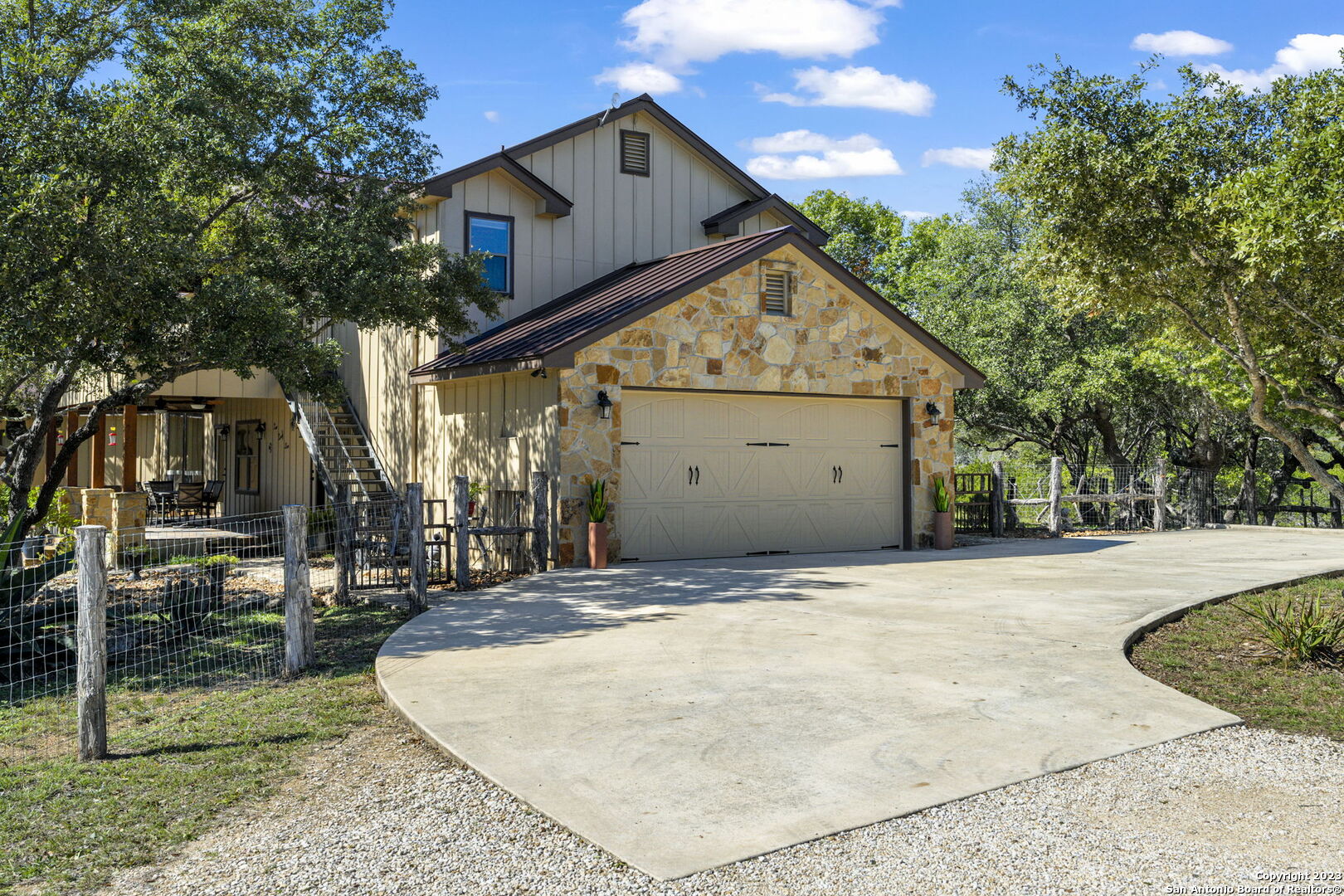 849 Madrona Ridge Drive Bandera, TX 78003 - Photo 43 of 44 a view of a house with a yard
