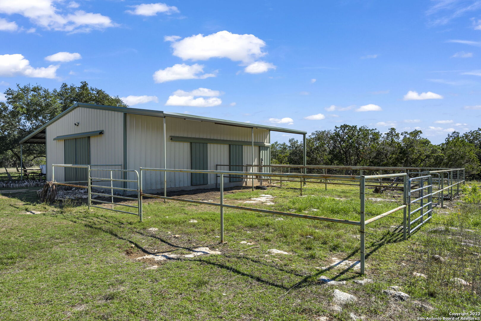849 Madrona Ridge Drive Bandera, TX 78003 - Photo 5 of 44 a view of a house with backyard
