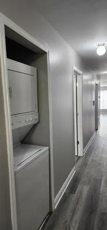 a white toilet sitting next to a bathroom sink