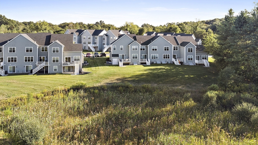 8 Winning Farm Road, Unit 8 Woburn, MA 01801 - Photo 33 of 42 a view of a town with small houses