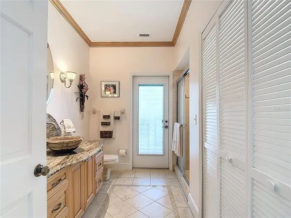 a view of kitchen with stainless steel appliances cabinets and a counter top space