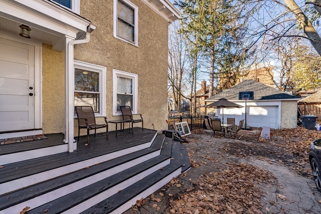 6 Maplewood Terrace Springfield, MA 01108 - Photo 4 of 24 a view of a house with a bench in a patio