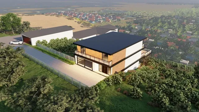 a view of a big yard with potted plants