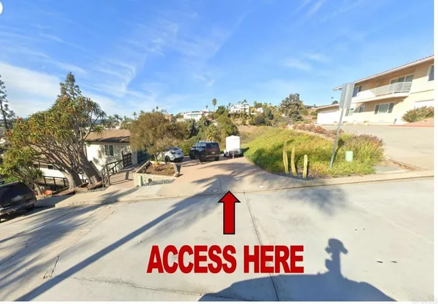 a sign that is on the side of a street