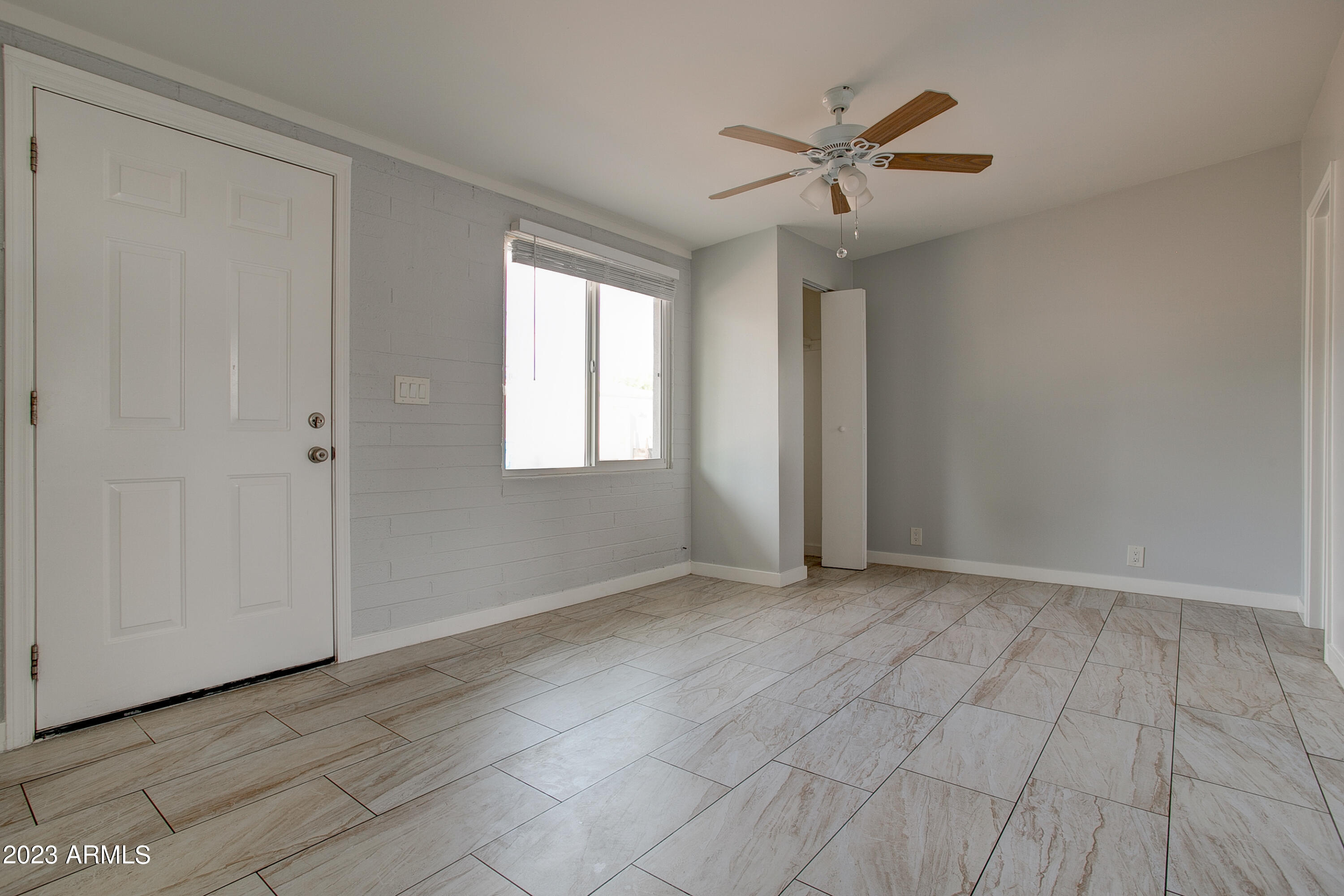 210 East Jones Avenue, Unit 2 Phoenix, AZ 85040 - Photo 20 of 27 a view of an empty room with a window