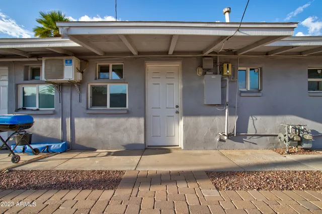 a view of a house with entertaining space