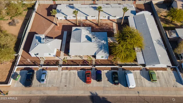 an aerial view of houses with outdoor space