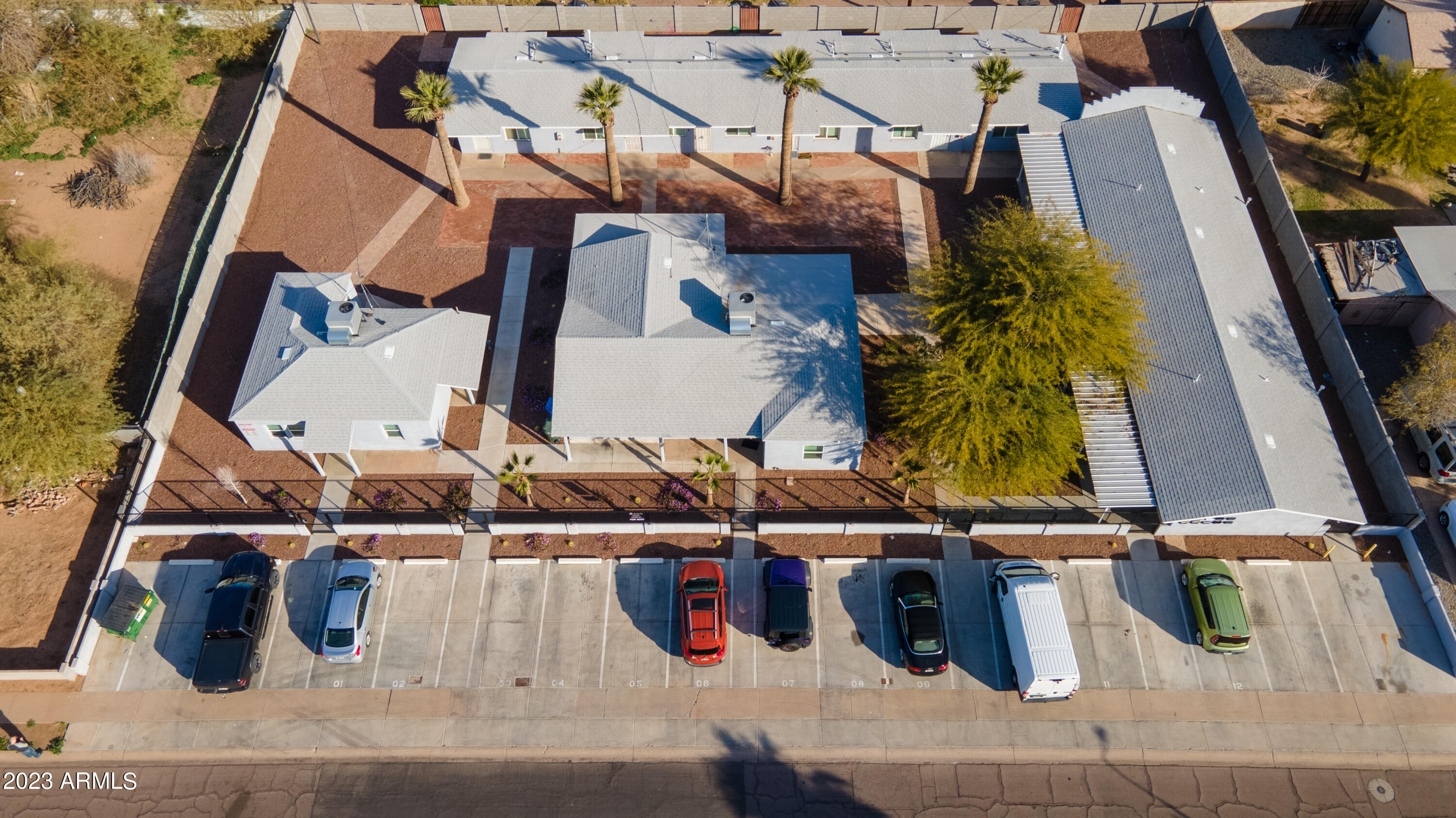 210 East Jones Avenue, Unit 2 Phoenix, AZ 85040 - Photo 8 of 27 an aerial view of houses with outdoor space