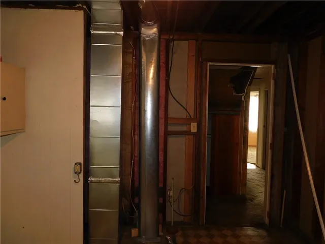 a bathroom with a glass door shower and sink