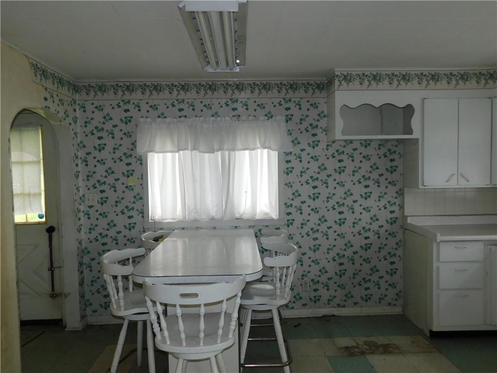110 Holbert Stretch Dilliner, PA 15327 - Photo 26 of 27 a dining room with a sink and a mirror