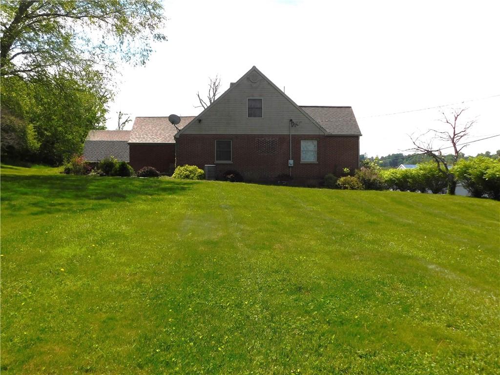 110 Holbert Stretch Dilliner, PA 15327 - Photo 5 of 27 a front view of house with yard and green space