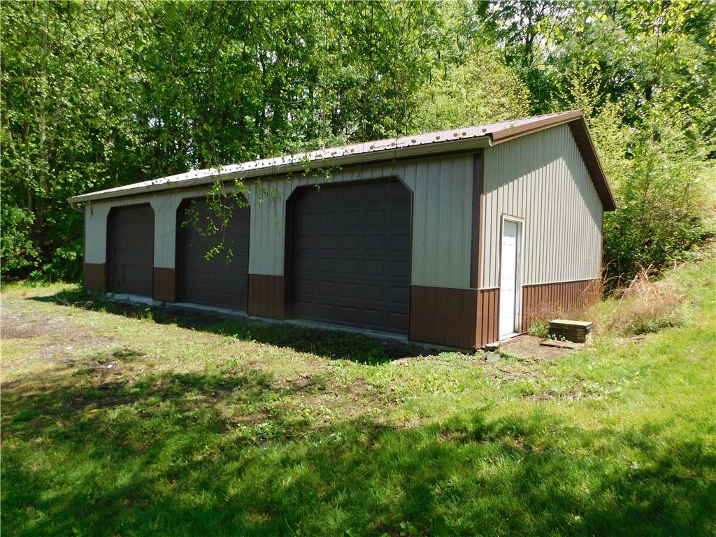 110 Holbert Stretch Dilliner, PA 15327 - Photo 10 of 27 a house with green field in front of it