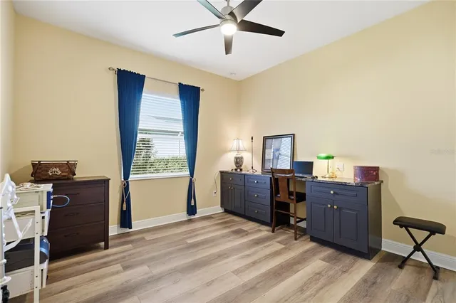 a workspace with furniture and window