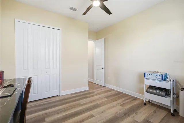 a view of room with workspace and a window