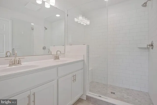 a view of a lake with houses in the back