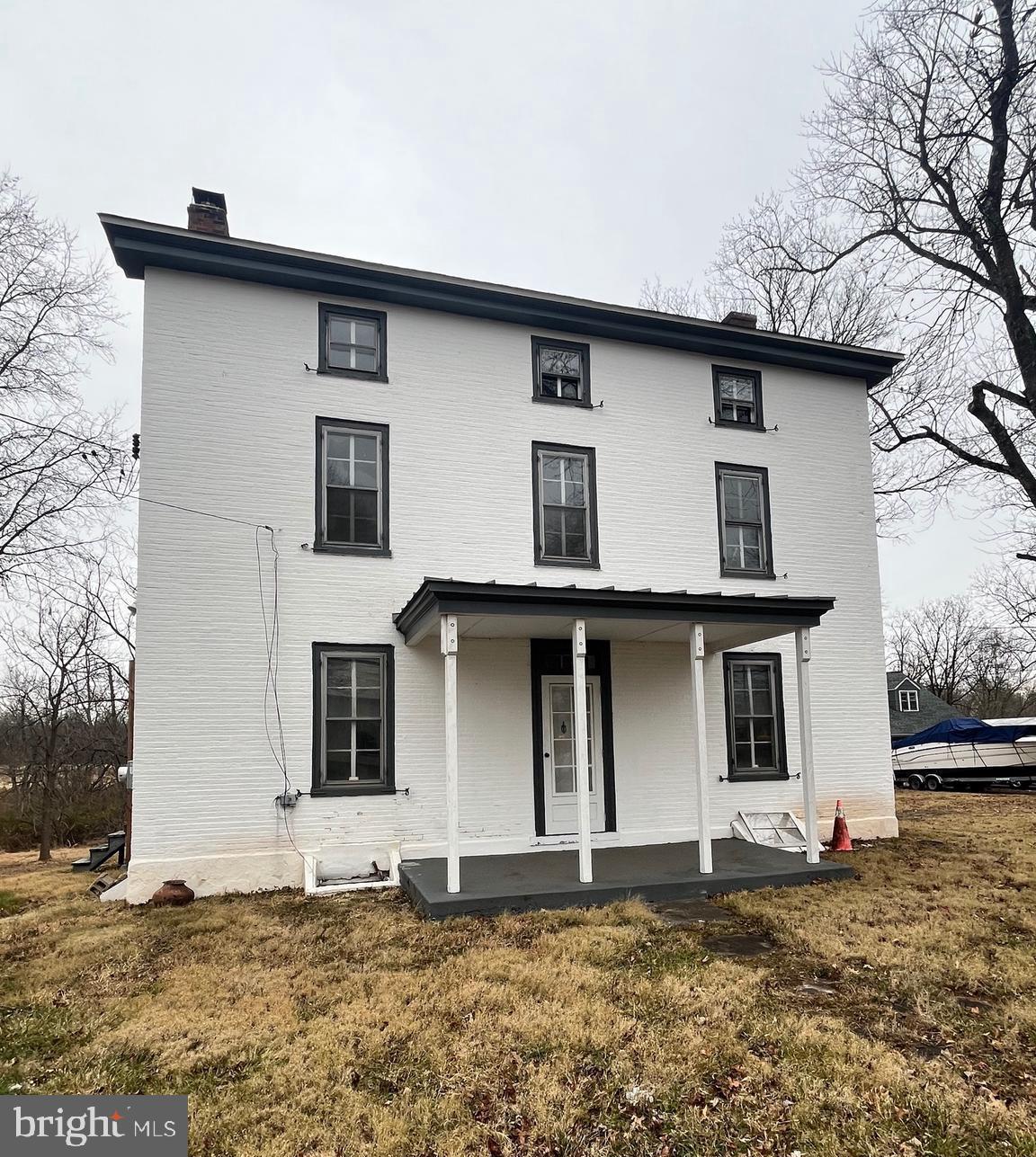 4595 County Line Road Line Lexington, PA 18914 - Photo 1 of 12 a front view of a house with a yard