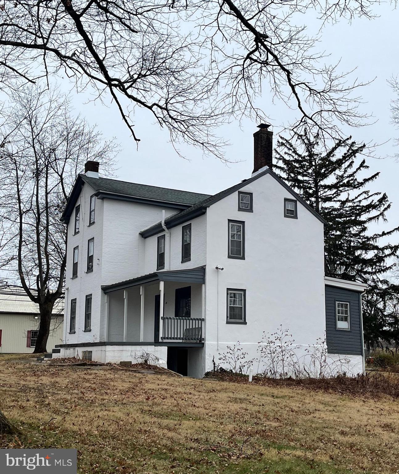 4595 County Line Road Line Lexington, PA 18914 - Photo 4 of 12 a view of a house with a yard