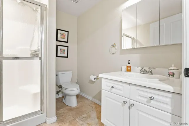 a view of bathroom with a sink and a toilet