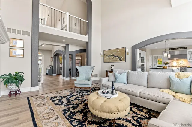 a living room with furniture and a table