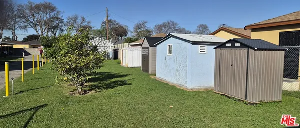 a view of outdoor space and yard