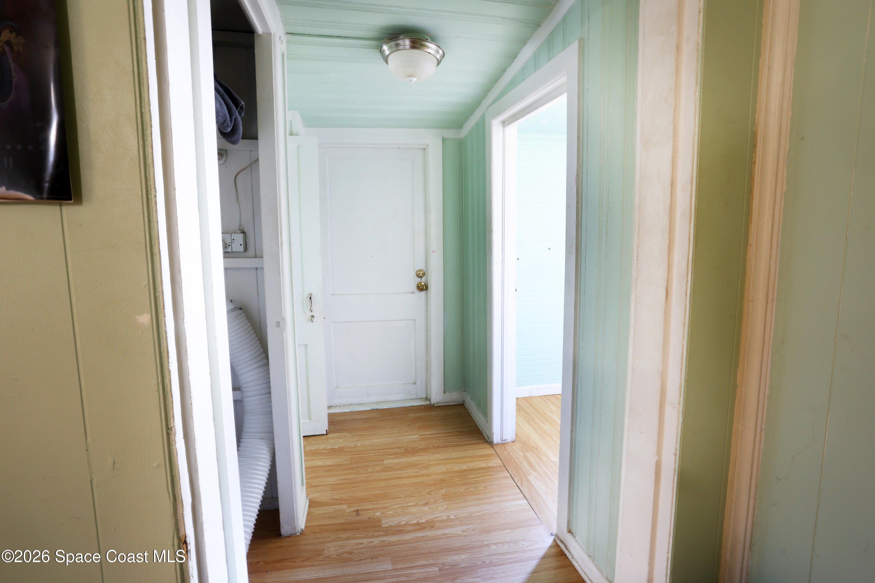 317 Pineda Street, Unit B Cocoa, FL 32922 - Photo 11 of 19 a view of a hallway with wooden floor